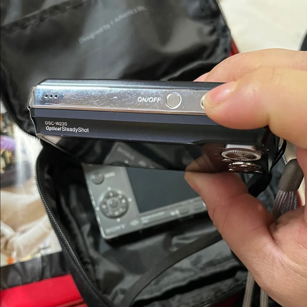 Sony Black and Silver Compact Digital Camera with Case and Accessories